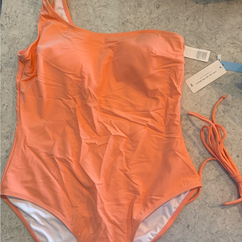 Coral-orange one shoulder swimsuit